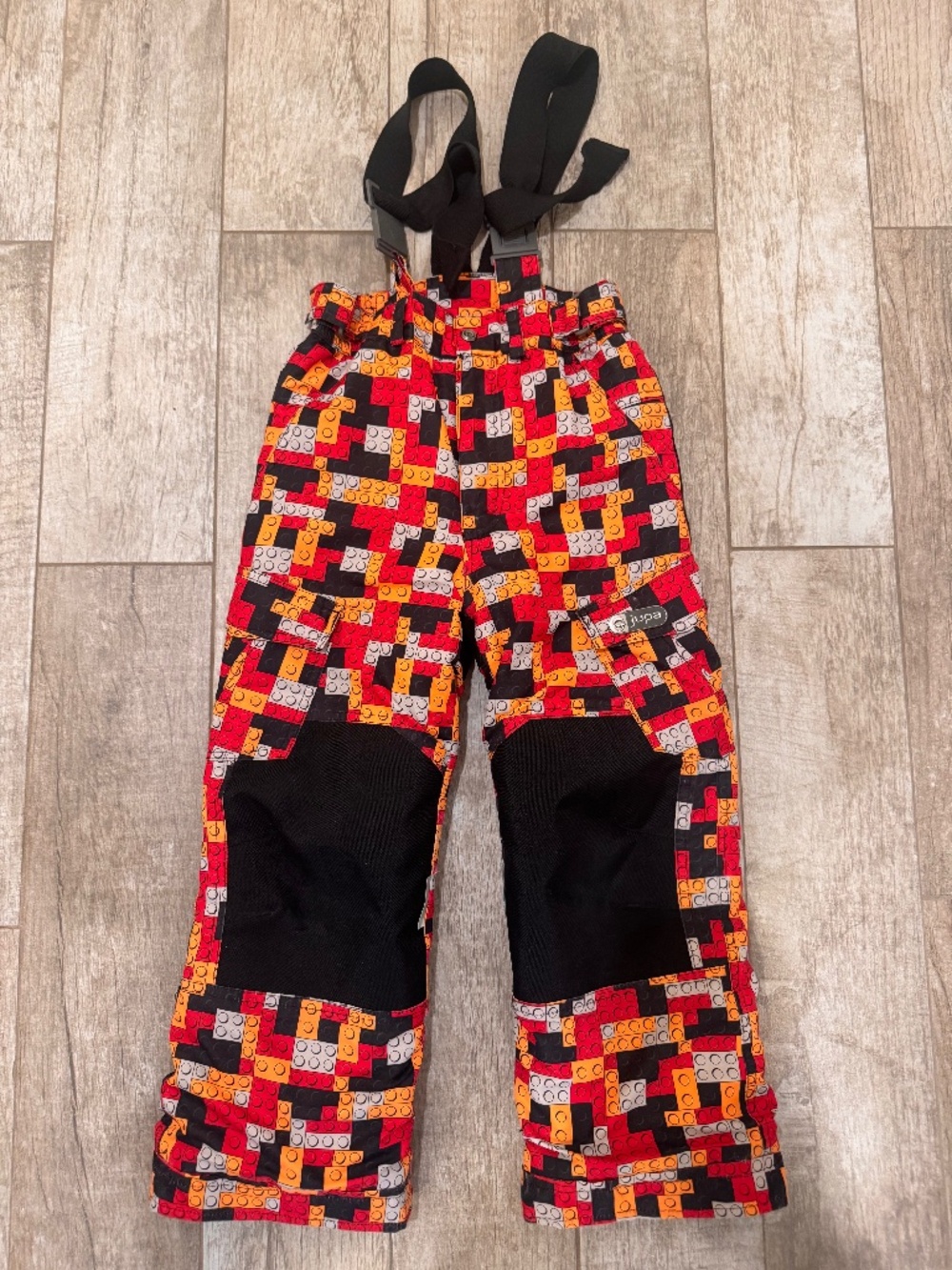 Jupa Lego snow paints with suspenders!
